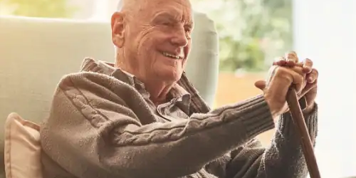 Medicare 2 Senior man relaxing at home during a Medicare Special Enrollment Period